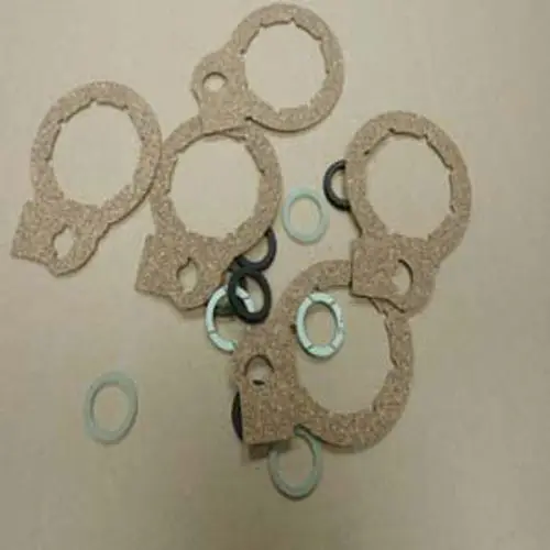 Dichtungen und Unterlegscheiben von Remeha, in verschiedenen Materialien und Formen, auf einer neutralen Oberfläche angeordnet.